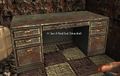 Metal Desk with many useful items in it